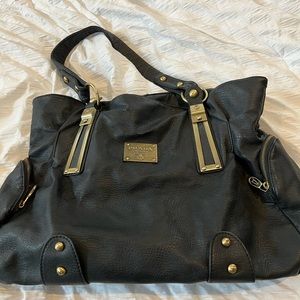 Prada Shoulder Bag. Used w a few scuffs but worth it!Plenty big for every day.